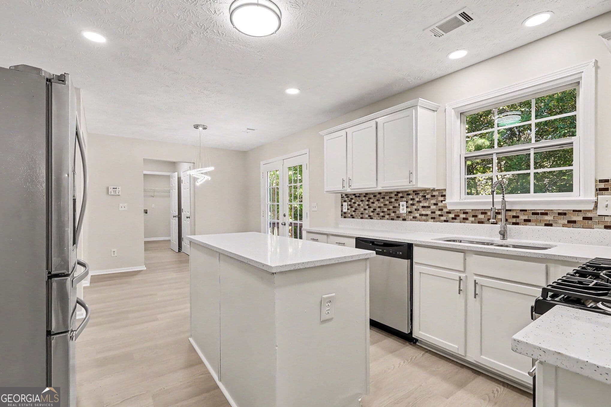 4 bedroom, 3.5 bathroom, 2,888 sq ft single family residence for sale at 1128 Mitford Lane, Dacula, GA 30019 — photo 3