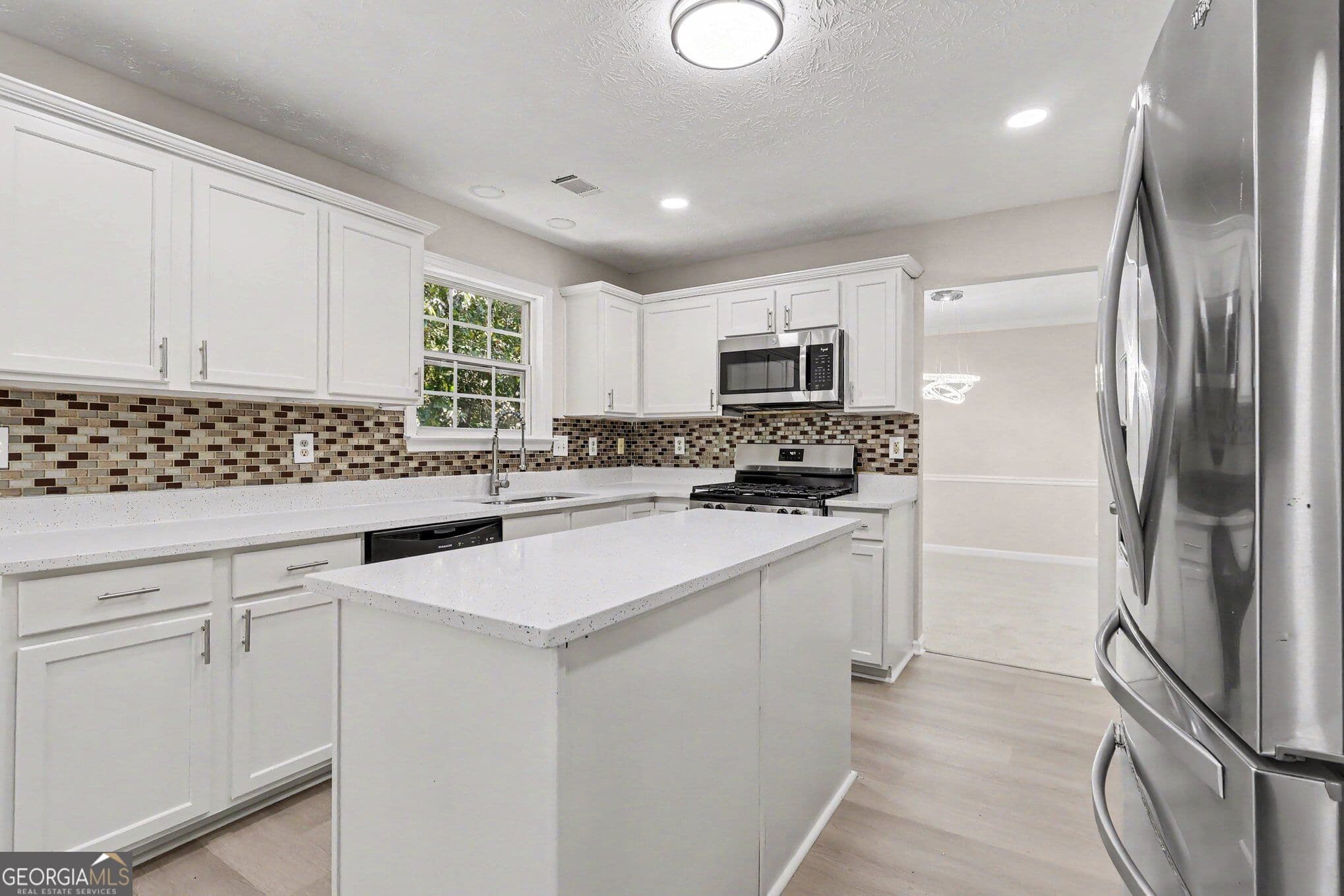 4 bedroom, 3.5 bathroom, 2,888 sq ft single family residence for sale at 1128 Mitford Lane, Dacula, GA 30019 — photo 5