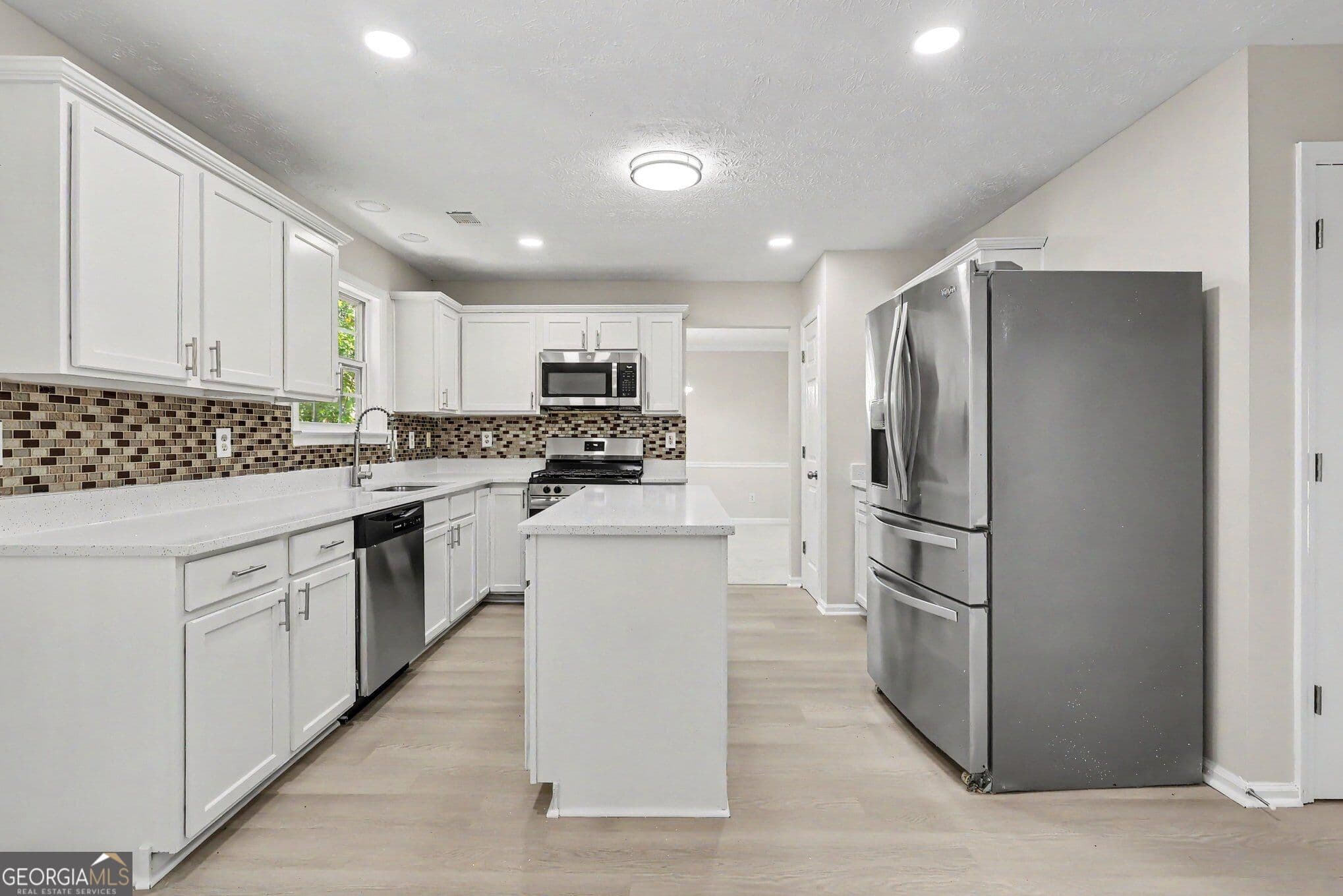4 bedroom, 3.5 bathroom, 2,888 sq ft single family residence for sale at 1128 Mitford Lane, Dacula, GA 30019 — photo 4
