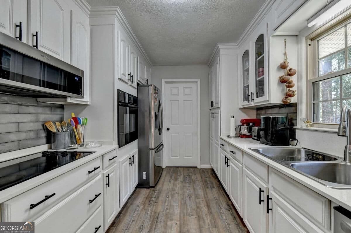4 bedroom, 3 bathroom, 2,437 sq ft single family residence for sale at 428 N Bethany Road, Mcdonough, GA 30252 — photo 8