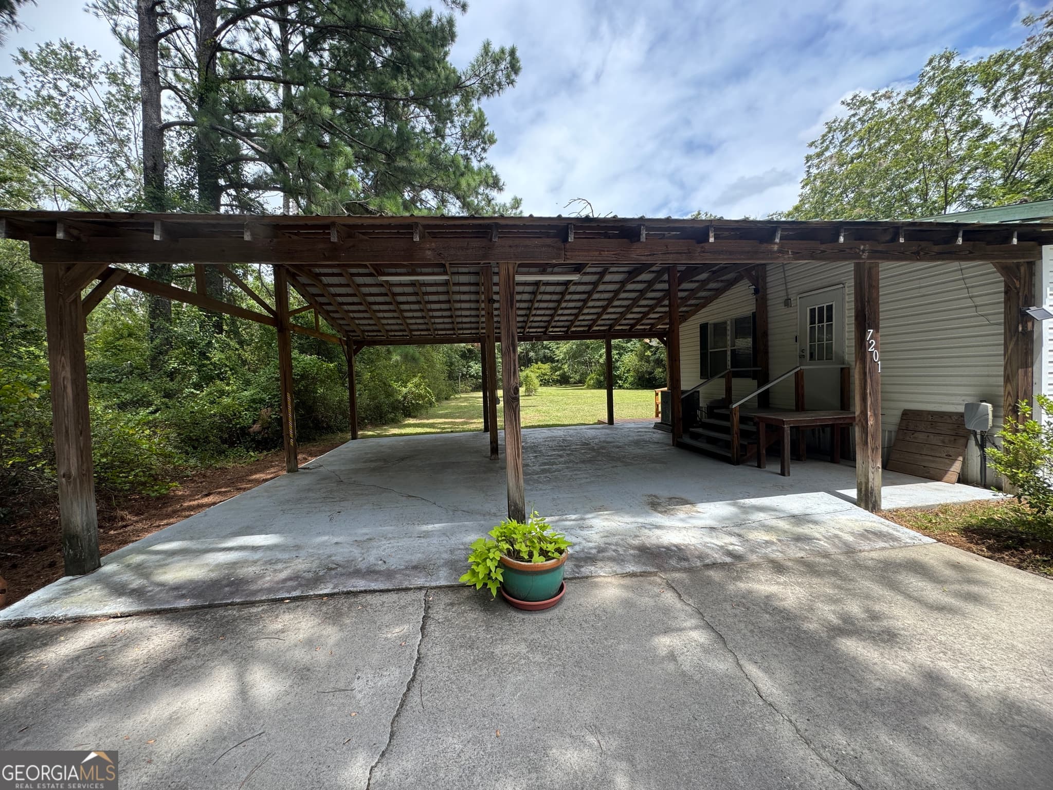 3 bedroom, 2 bathroom, 1,820 sq ft manufactured home,single family residence for sale at 7201 Bowen Road, Twin City, GA 30471 — photo 6