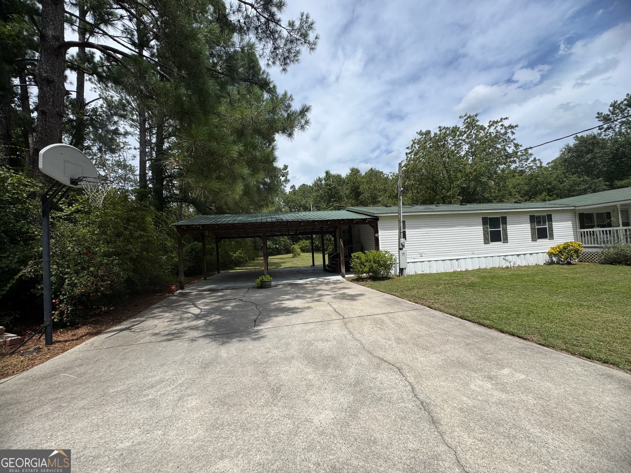 3 bedroom, 2 bathroom, 1,820 sq ft manufactured home,single family residence for sale at 7201 Bowen Road, Twin City, GA 30471 — photo 9