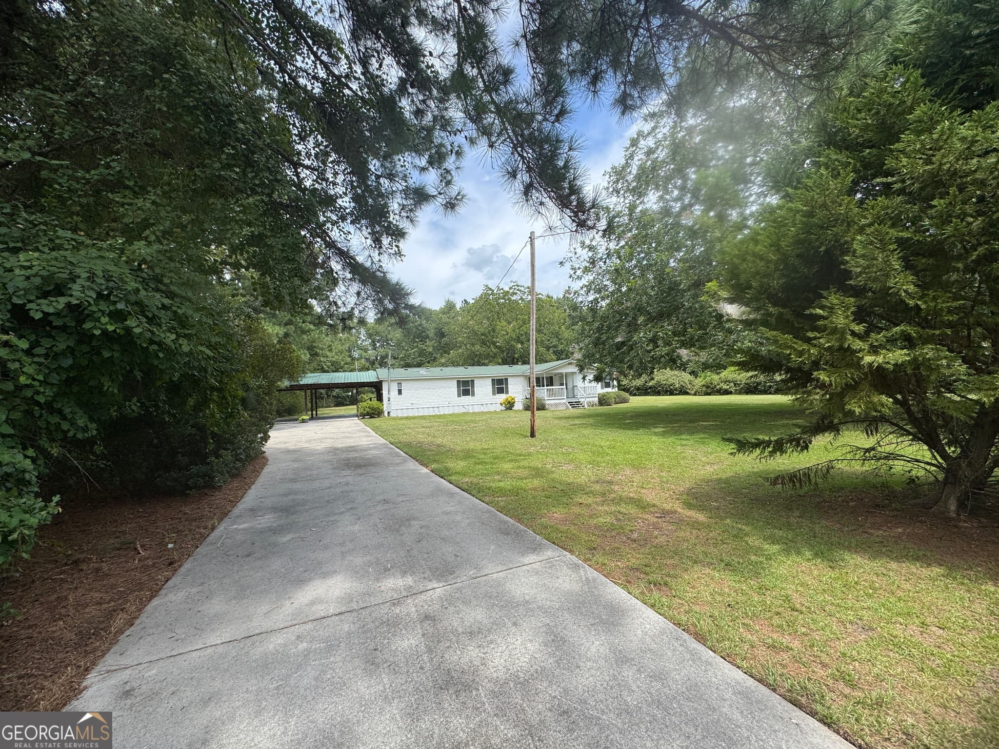 3 bedroom, 2 bathroom, 1,820 sq ft manufactured home,single family residence for sale at 7201 Bowen Road, Twin City, GA 30471 — photo 10