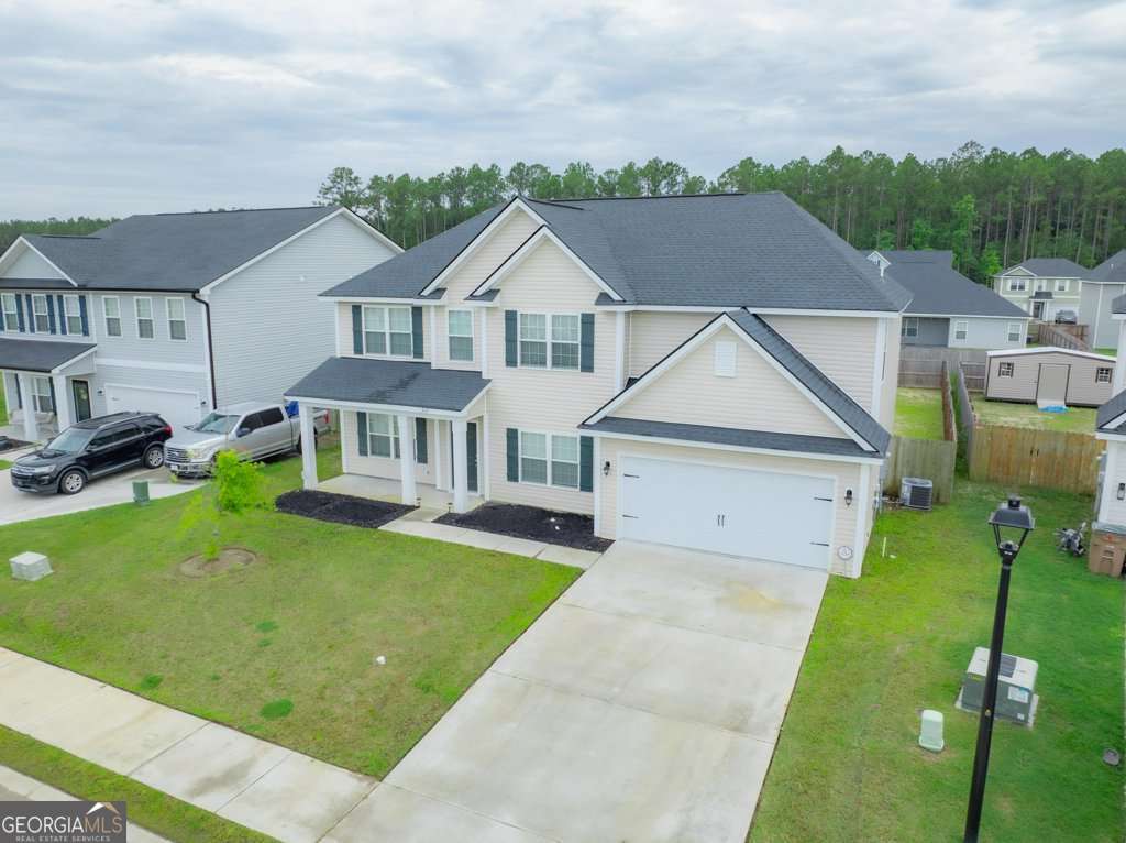 5 bedroom, 3 bathroom, 2,870 sq ft single family residence for sale at 309 Sapwood Way, Hinesville, GA 31313 — photo 2
