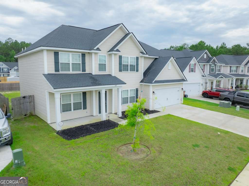 5 bedroom, 3 bathroom, 2,870 sq ft single family residence for sale at 309 Sapwood Way, Hinesville, GA 31313 — photo 3