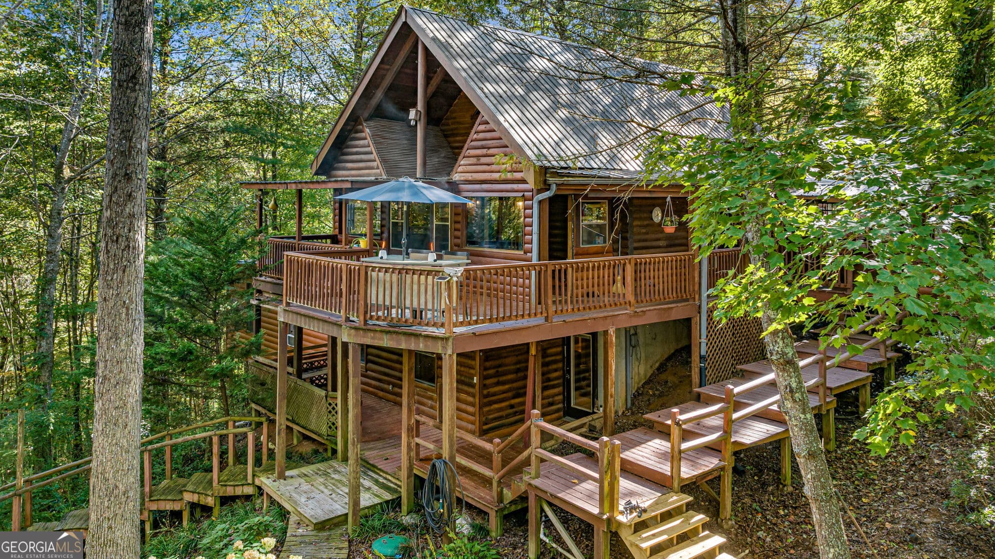 2 bedroom, 4.5 bathroom, 2,130 sq ft cabin,single family residence for sale at 102 Frosty Mountain Road, Mineral Bluff, GA 30559 — photo 2