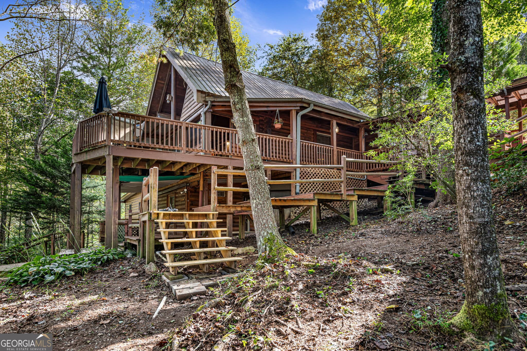2 bedroom, 4.5 bathroom, 2,130 sq ft cabin,single family residence for sale at 102 Frosty Mountain Road, Mineral Bluff, GA 30559 — photo 10
