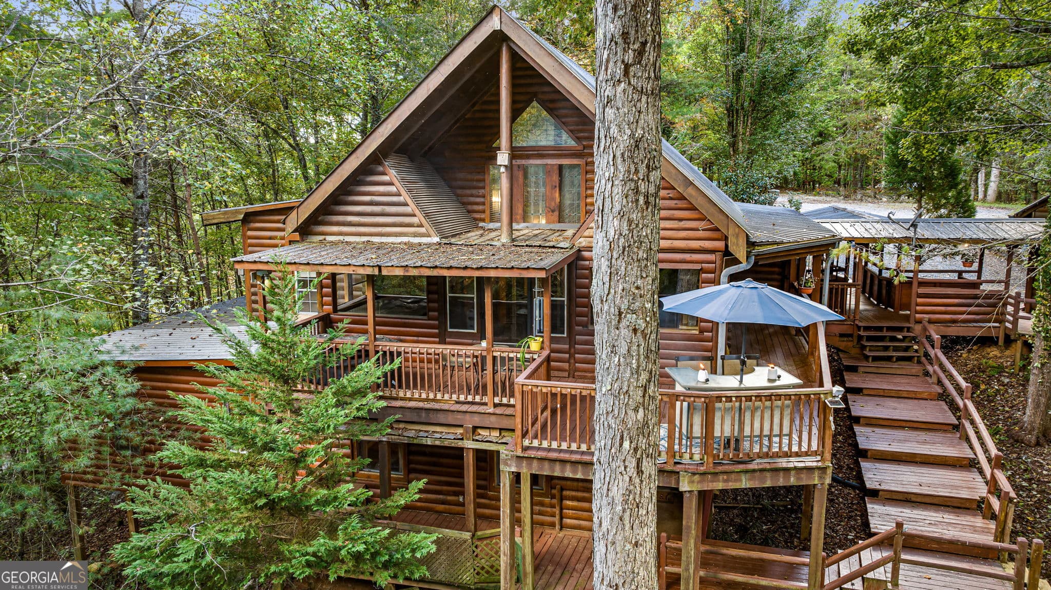 2 bedroom, 4.5 bathroom, 2,130 sq ft cabin,single family residence for sale at 102 Frosty Mountain Road, Mineral Bluff, GA 30559 — photo 8