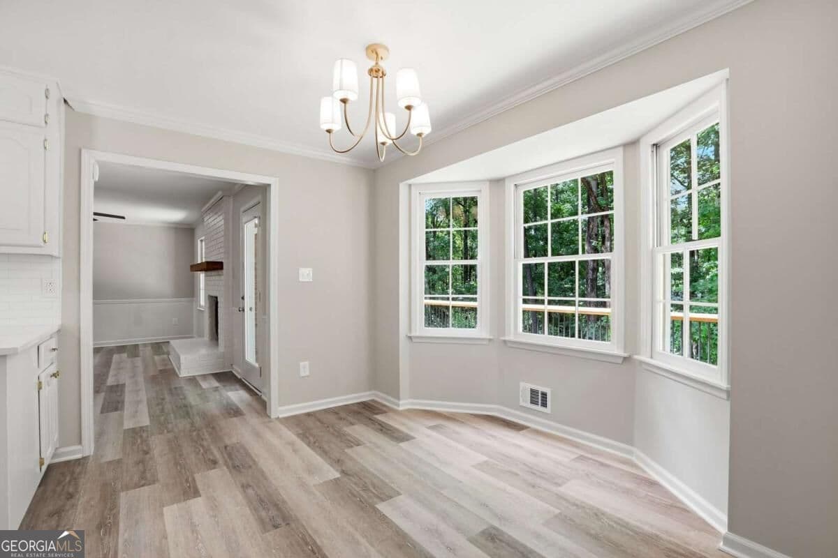 5 bedroom, 3 bathroom, 3,292 sq ft single family residence for sale at 2595 Marsha Circle, Cumming, GA 30041 — photo 7