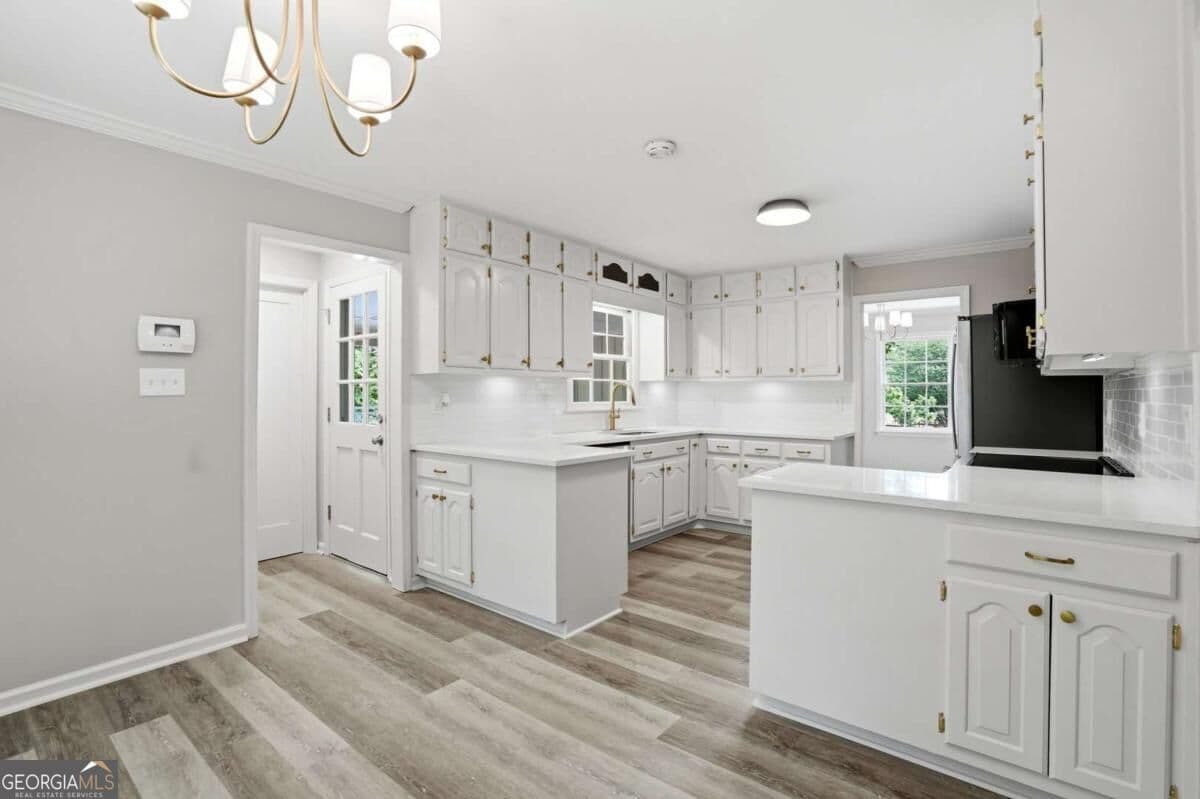 5 bedroom, 3 bathroom, 3,292 sq ft single family residence for sale at 2595 Marsha Circle, Cumming, GA 30041 — photo 4