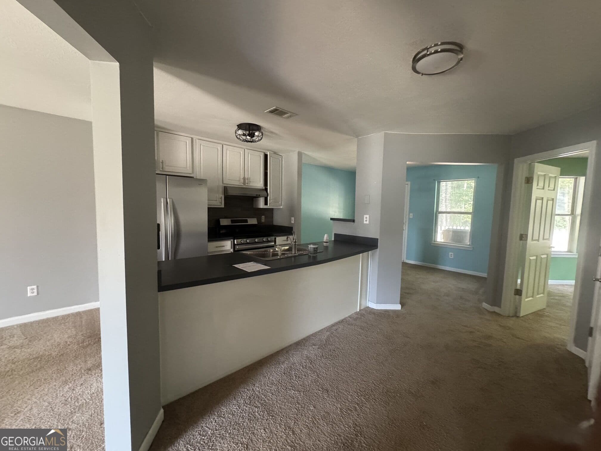 2 bedroom, 1 bathroom, 969 sq ft single family residence for sale at 136 Glynn Addy Drive, Stockbridge, GA 30281 — photo 4