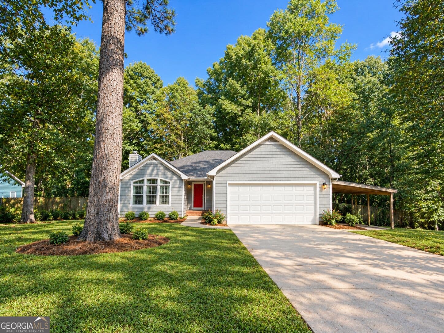 3 bedroom, 2 bathroom, 1,632 sq ft single family residence for sale at 1323 Smokerise Lane, Auburn, GA 30011 — photo 2
