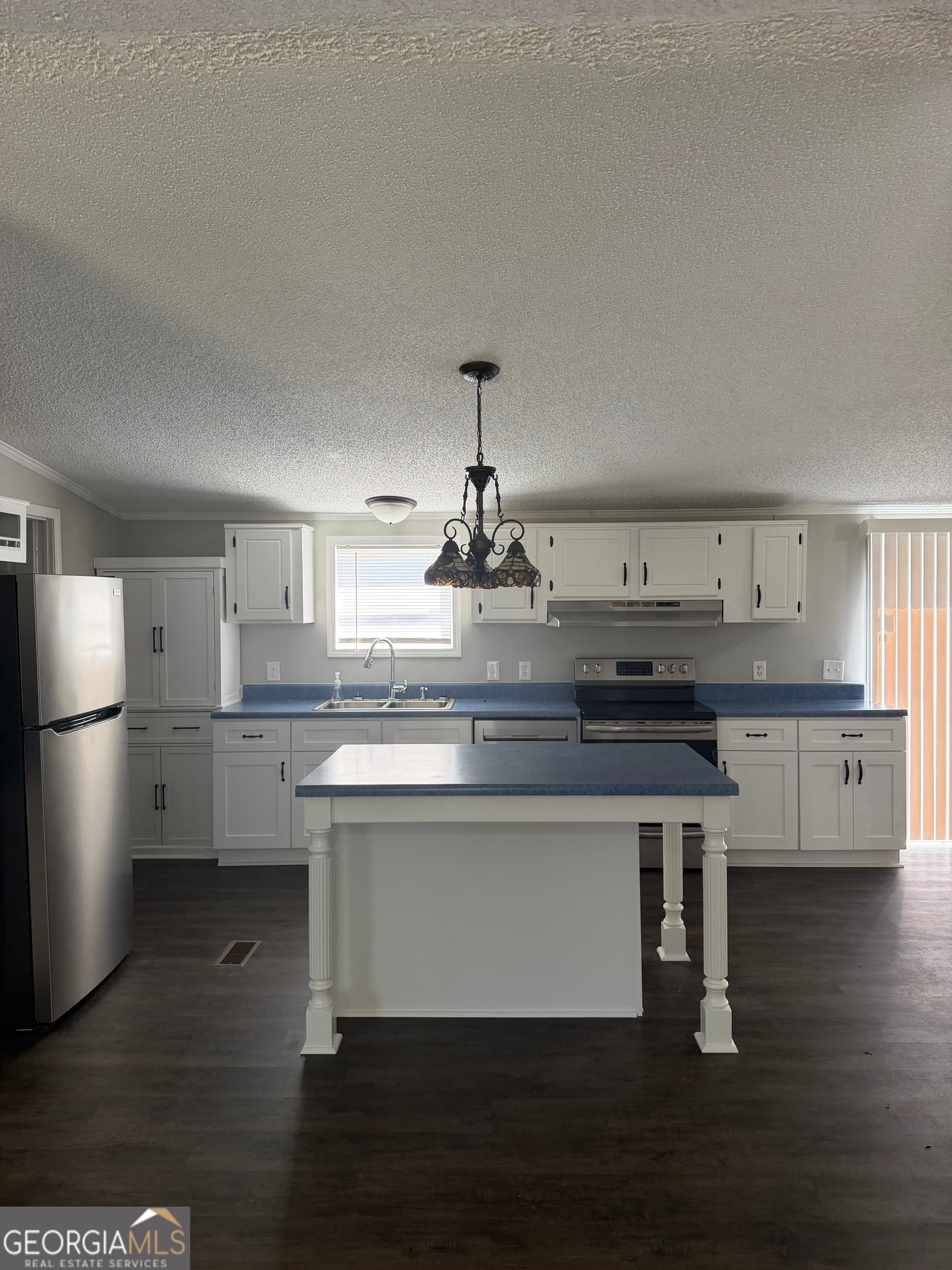 4 bedroom, 2 bathroom manufactured home,single family residence for sale at 405 Windsor Parkway # 405W, Hampton, GA 30228 — photo 6
