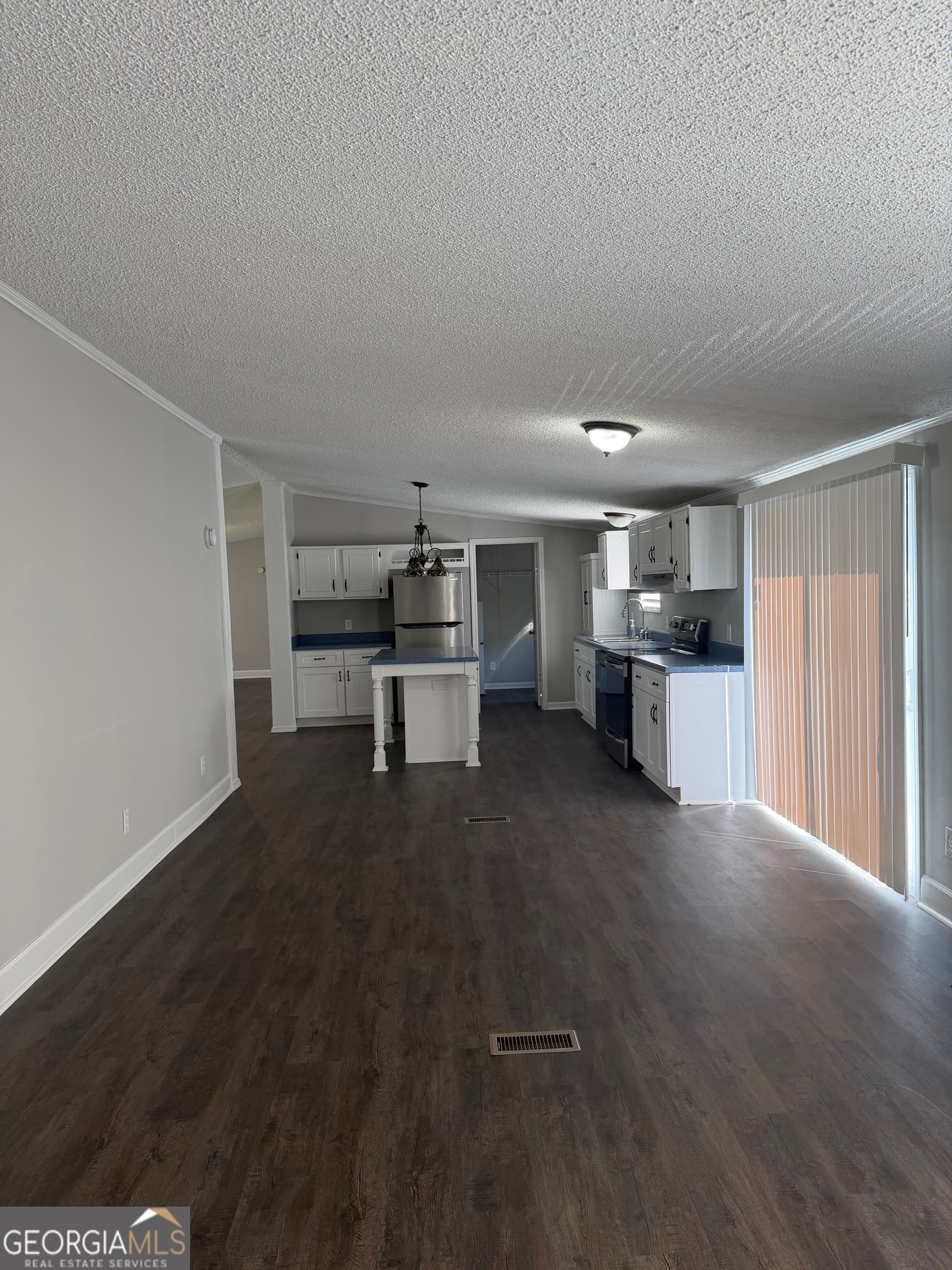 4 bedroom, 2 bathroom manufactured home,single family residence for sale at 405 Windsor Parkway # 405W, Hampton, GA 30228 — photo 7