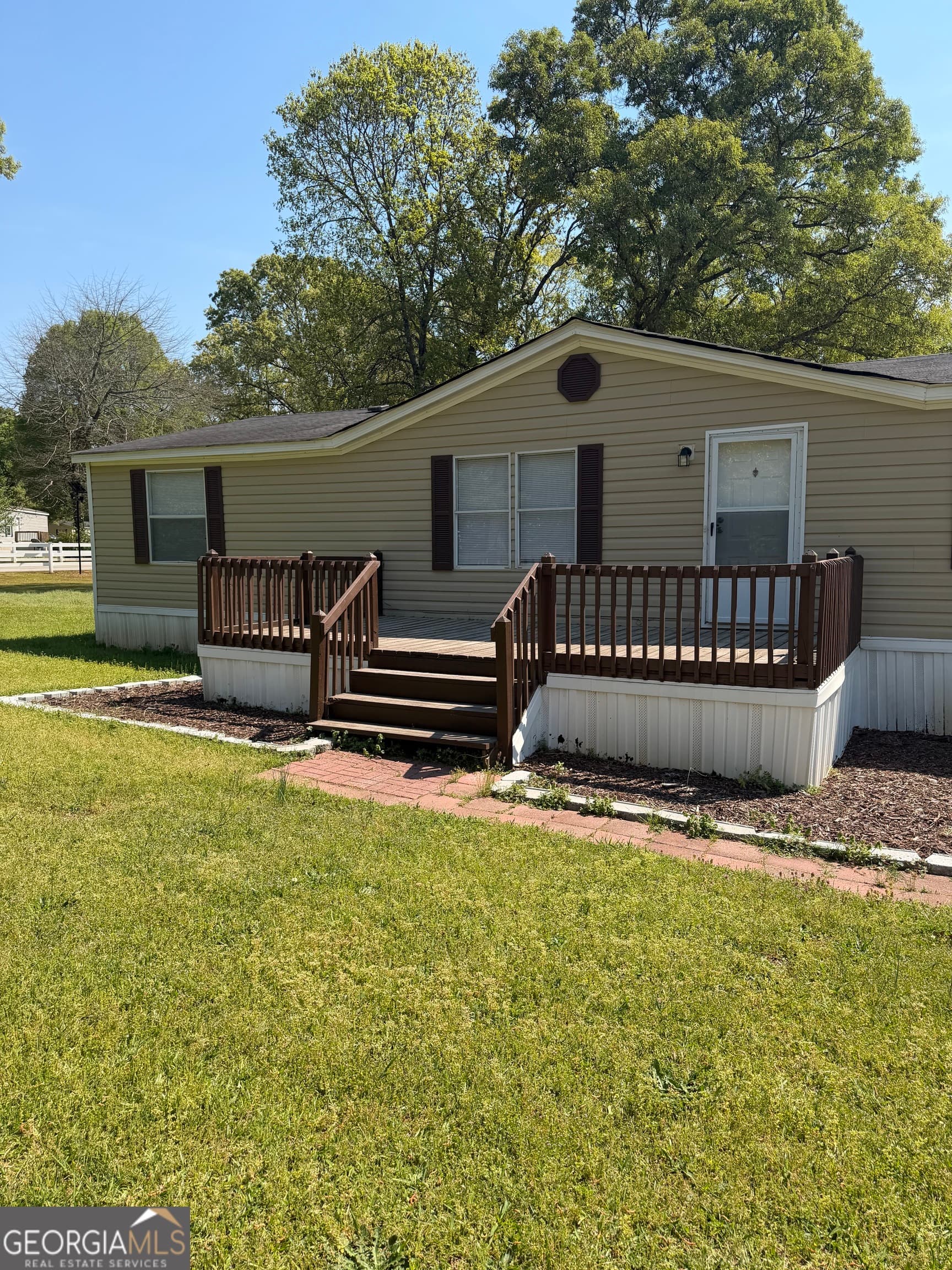 4 bedroom, 2 bathroom manufactured home,single family residence for sale at 405 Windsor Parkway # 405W, Hampton, GA 30228