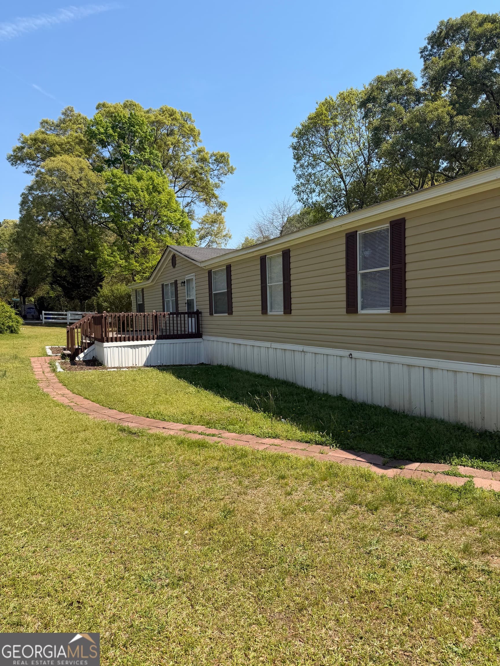 4 bedroom, 2 bathroom manufactured home,single family residence for sale at 405 Windsor Parkway # 405W, Hampton, GA 30228 — photo 5