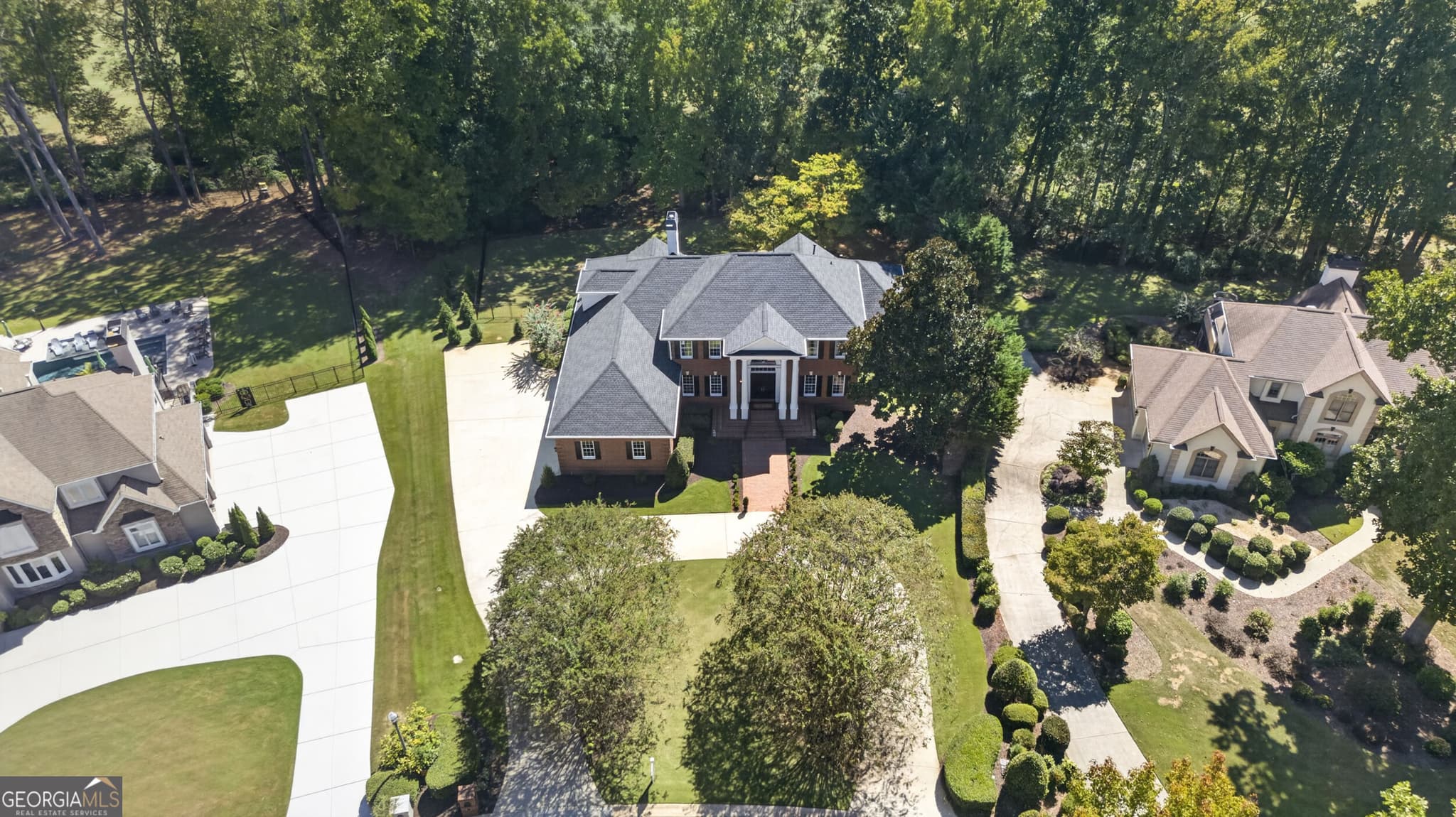5 bedroom, 5 bathroom, 6,059 sq ft single family residence for sale at 125 Torrey Pines Court, Newnan, GA 30265 — photo 2
