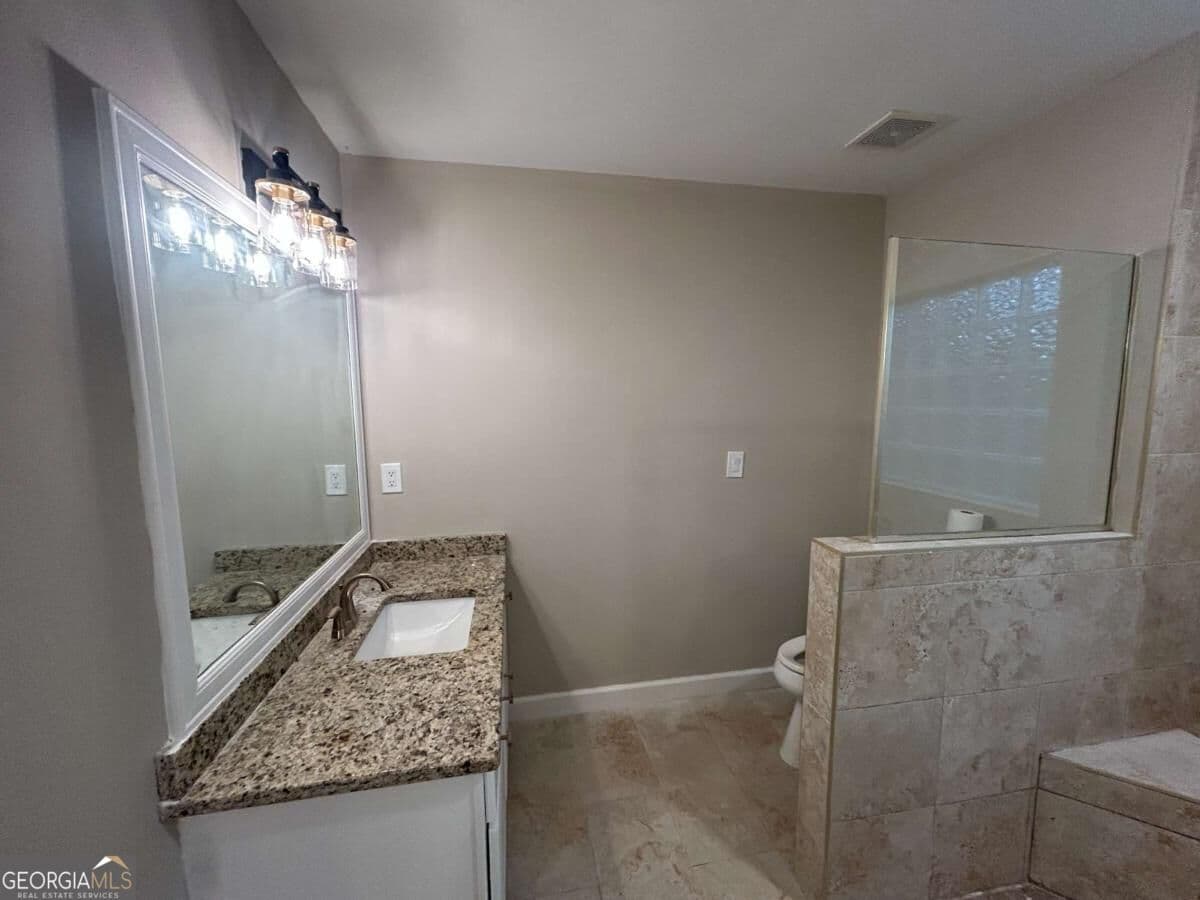 5 bedroom, 3.5 bathroom, 4,046 sq ft single family residence for sale at 496 Walnut Creek Drive, Stockbridge, GA 30281 — photo 4