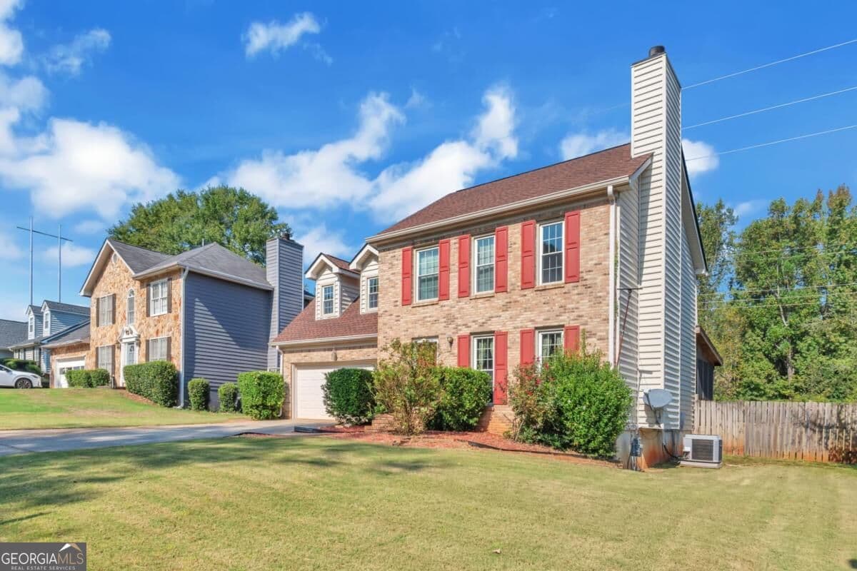 4 bedroom, 2.5 bathroom single family residence for sale at 1355 Wheatfield Drive, Lawrenceville, GA 30043 — photo 3