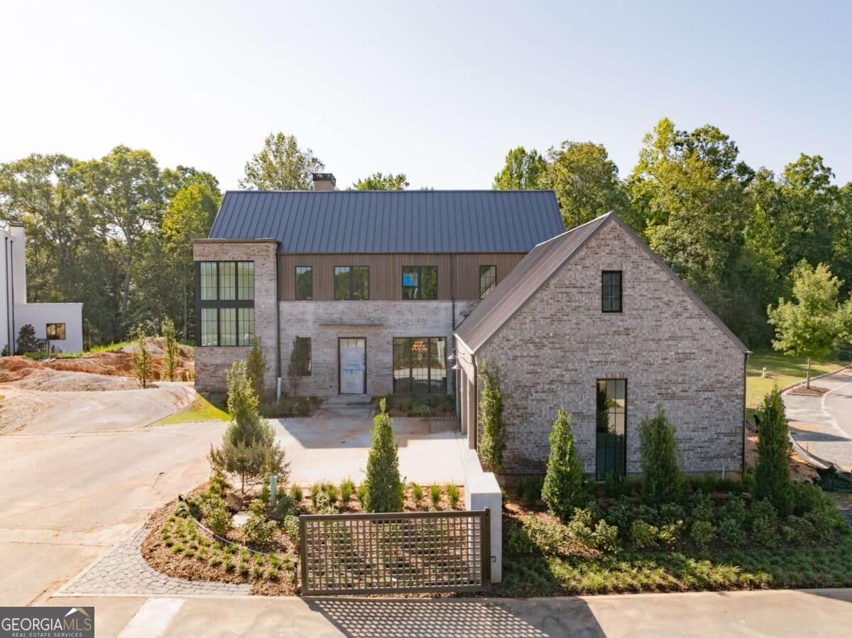 5 bedroom, 7 bathroom, 6,026 sq ft single family residence for sale at 110 Reed Way, Fayetteville, GA 30214 — photo 2