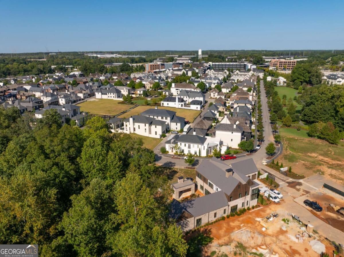 5 bedroom, 7 bathroom, 6,026 sq ft single family residence for sale at 110 Reed Way, Fayetteville, GA 30214 — photo 7