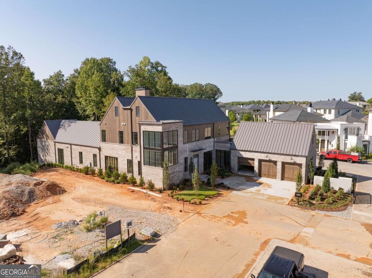 5 bedroom, 7 bathroom, 6,026 sq ft single family residence for sale at 110 Reed Way, Fayetteville, GA 30214 — photo 3