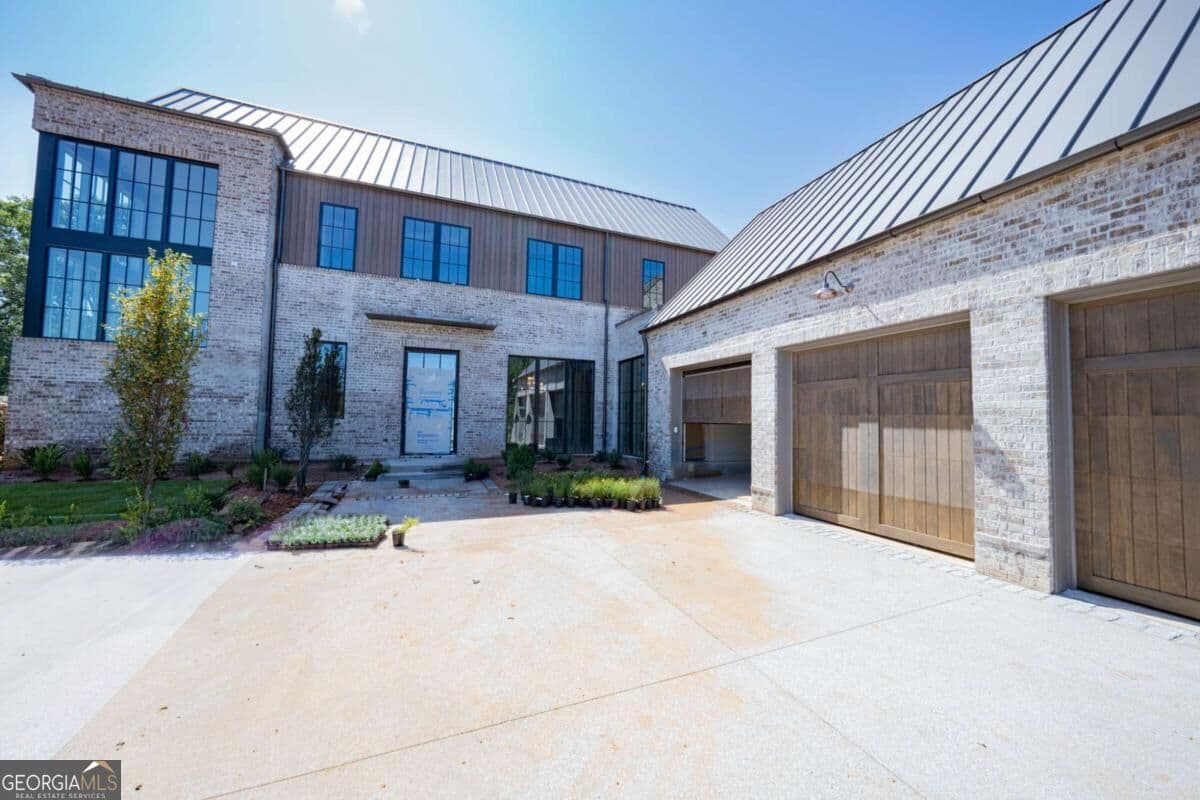5 bedroom, 7 bathroom, 6,026 sq ft single family residence for sale at 110 Reed Way, Fayetteville, GA 30214 — photo 5
