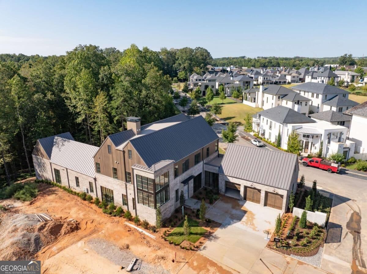 5 bedroom, 7 bathroom, 6,026 sq ft single family residence for sale at 110 Reed Way, Fayetteville, GA 30214 — photo 4
