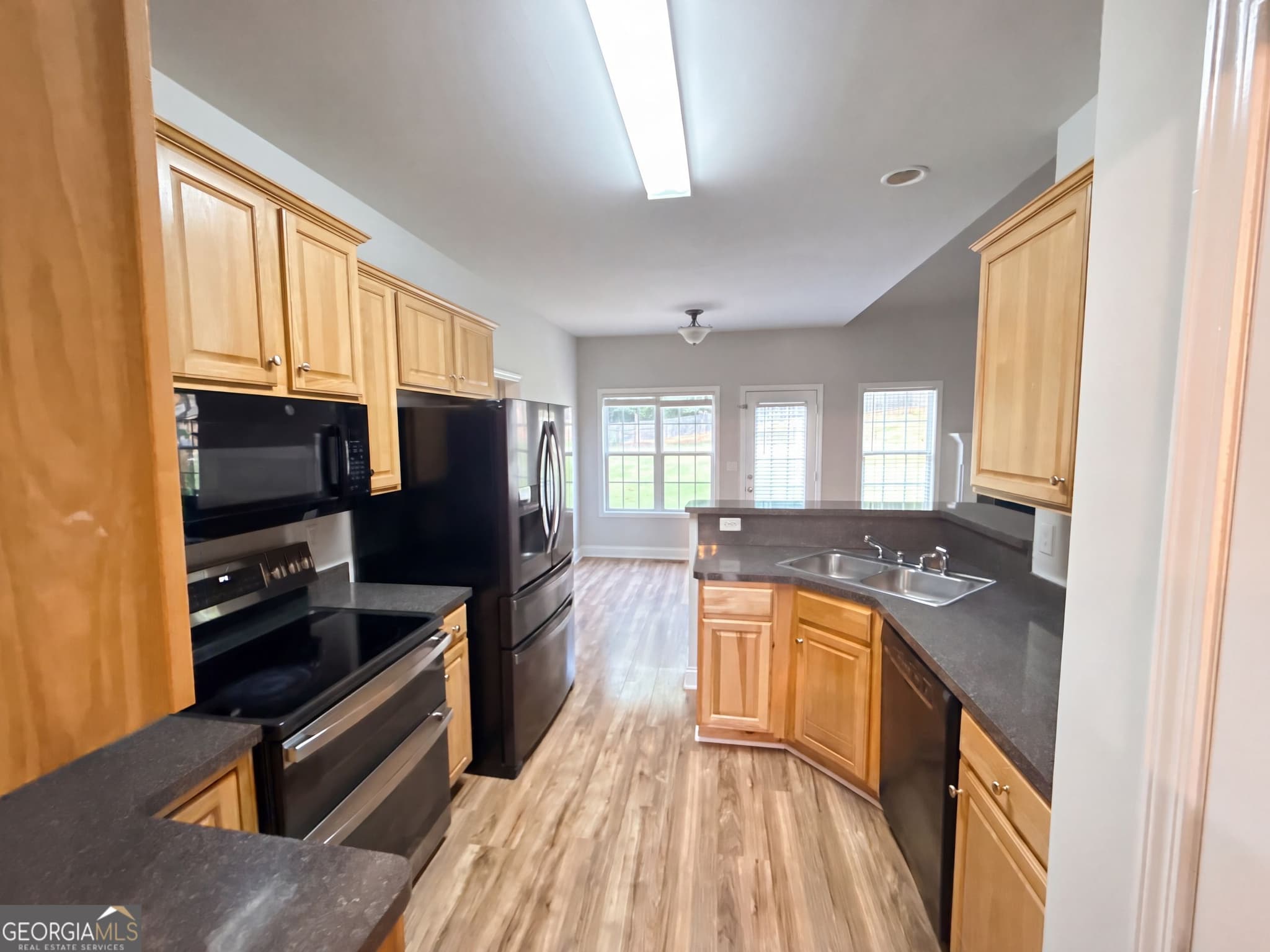 6 bedroom, 3 bathroom, 3,498 sq ft single family residence for sale at 8230 Mossybrook Lane, Douglasville, GA 30135 — photo 2