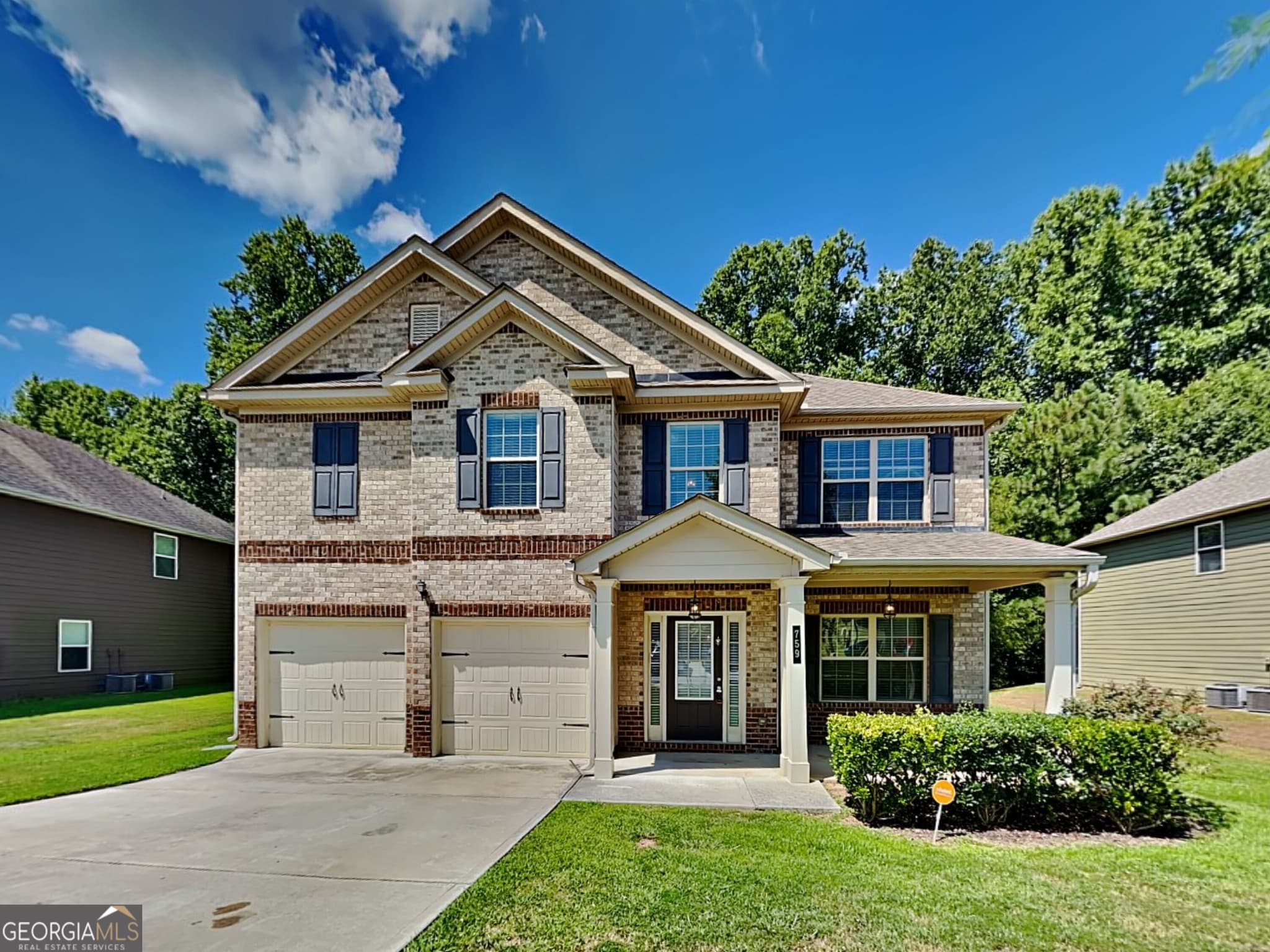 4 bedroom, 2.5 bathroom, 2,350 sq ft single family residence for sale at 759 Rolling Downs Drive, Loganville, GA 30052 — photo 2