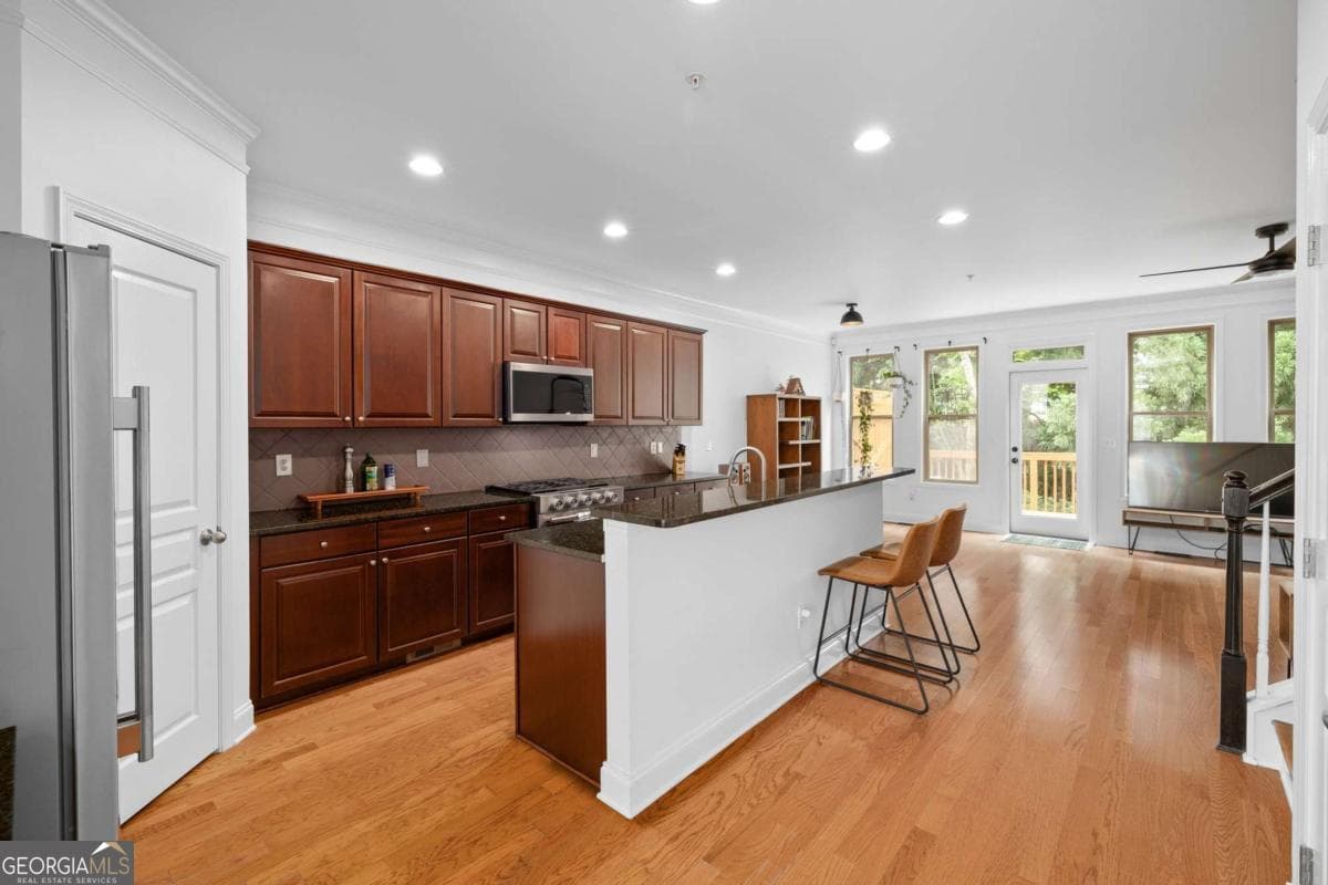 4 bedroom, 3.5 bathroom, 2,624 sq ft townhouse for sale at 9009 Woodland Trail, Alpharetta, GA 30009 — photo 6