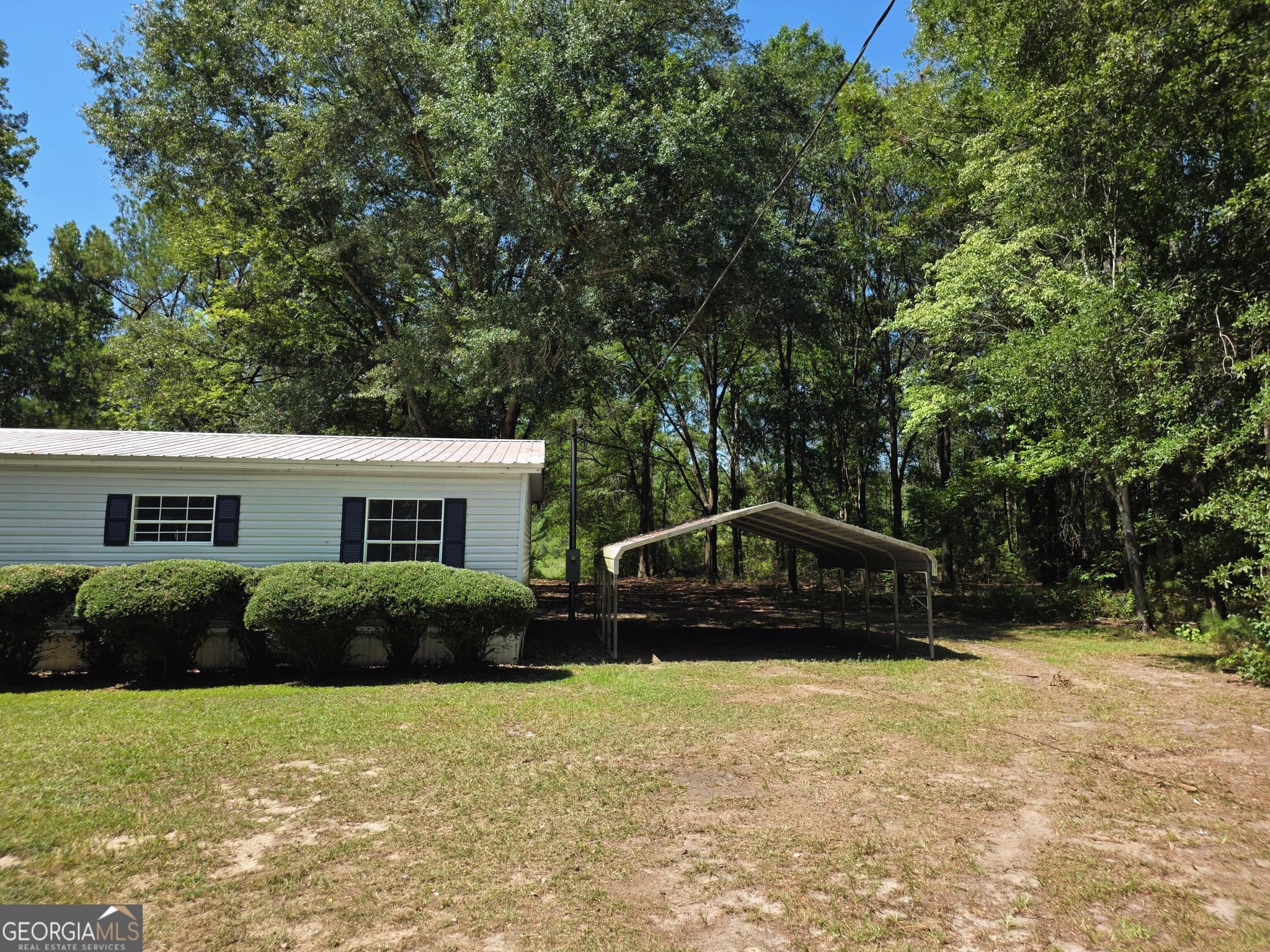 3 bedroom, 2 bathroom, 1,596 sq ft single family residence for sale at 133 Joe Oglesby Road, Portal, GA 30450 — photo 2