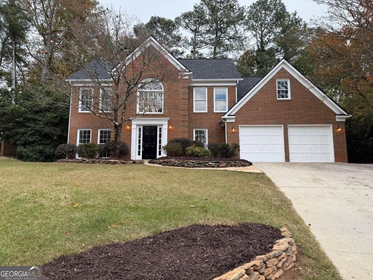4 bedroom, 2.5 bathroom, 2,132 sq ft single family residence for sale at 5325 Hillgate Crossing, Alpharetta, GA 30005
