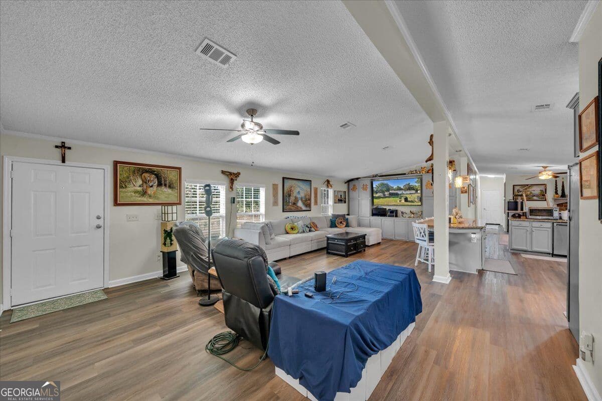 4 bedroom, 2 bathroom, 2,128 sq ft single family residence for sale at 319 Pope Road, Roberta, GA 31078 — photo 3