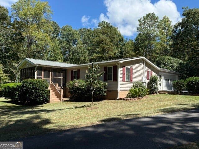 3 bedroom, 2 bathroom, 1,584 sq ft manufactured home,single family residence for sale at 145 Log Cabin Road, Milledgeville, GA 31061 — photo 1 of 41