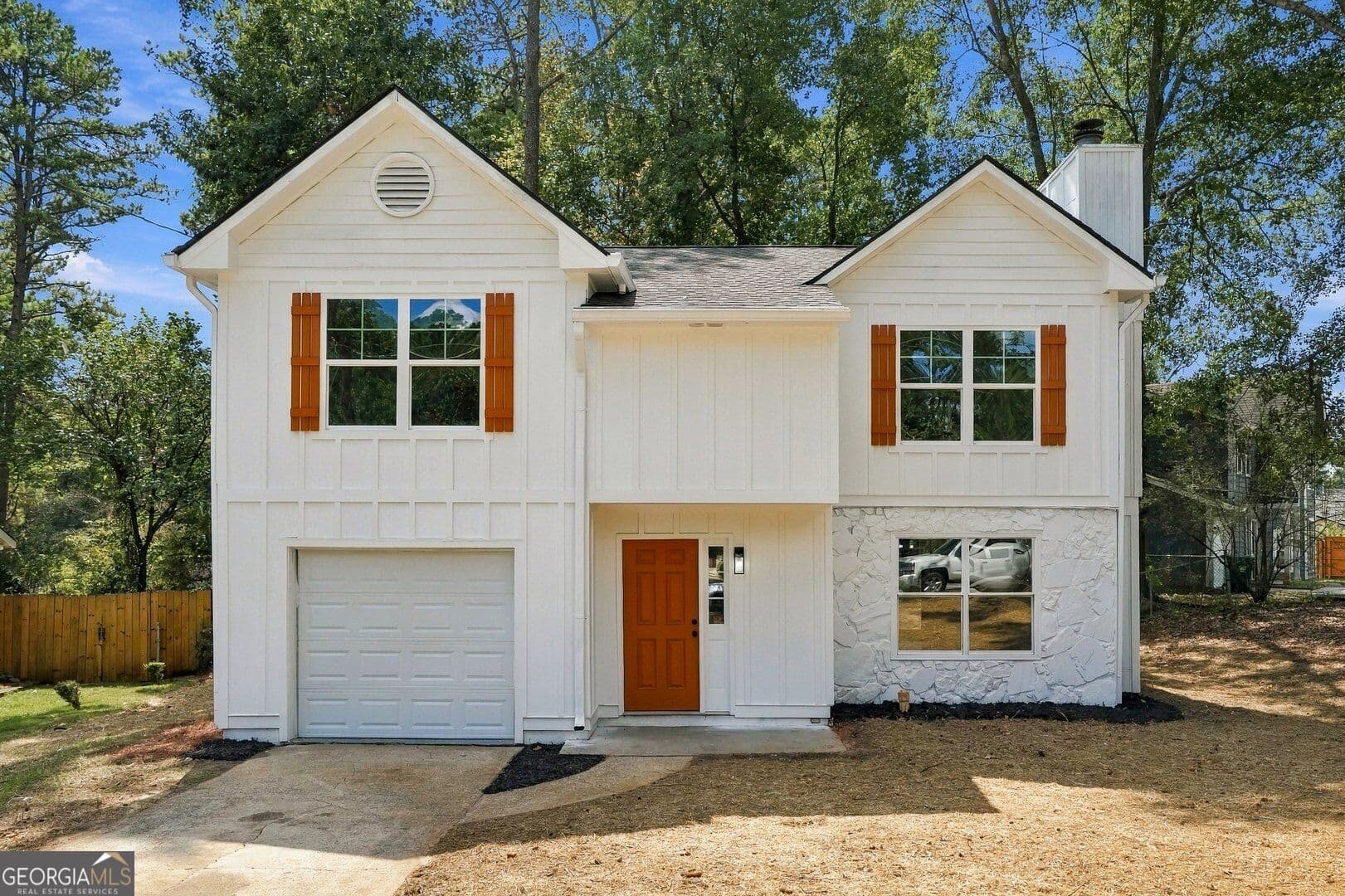 3 bedroom, 2 bathroom, 1,884 sq ft single family residence for sale at 5441 Forest Path Court, Stone Mountain, GA 30088 — photo 1 of 34