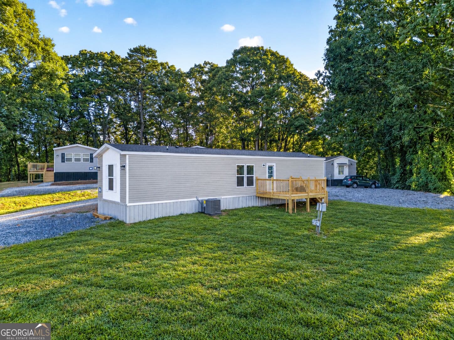 2 bedroom, 2 bathroom, 877 sq ft manufactured home,single family residence for sale at 60 Bennys Drive, Cleveland, GA 30528 — photo 2
