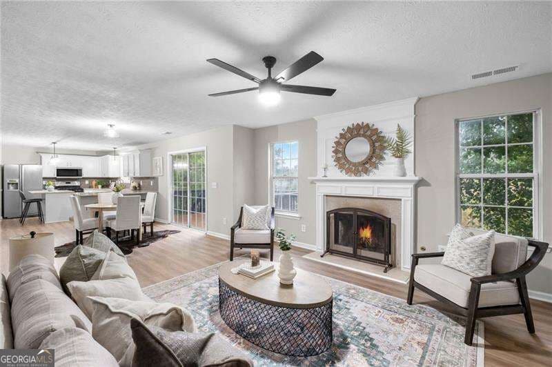 6 bedroom, 3.5 bathroom, 3,876 sq ft single family residence for sale at 5077 Newpark Drive, Acworth, GA 30101 — photo 2