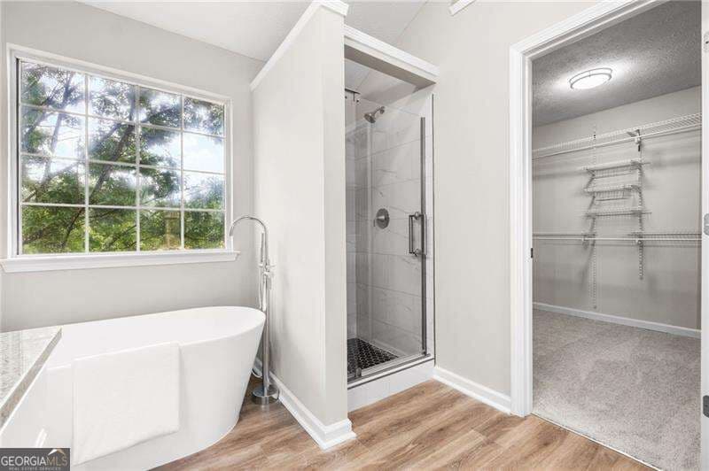 6 bedroom, 3.5 bathroom, 3,876 sq ft single family residence for sale at 5077 Newpark Drive, Acworth, GA 30101 — photo 3