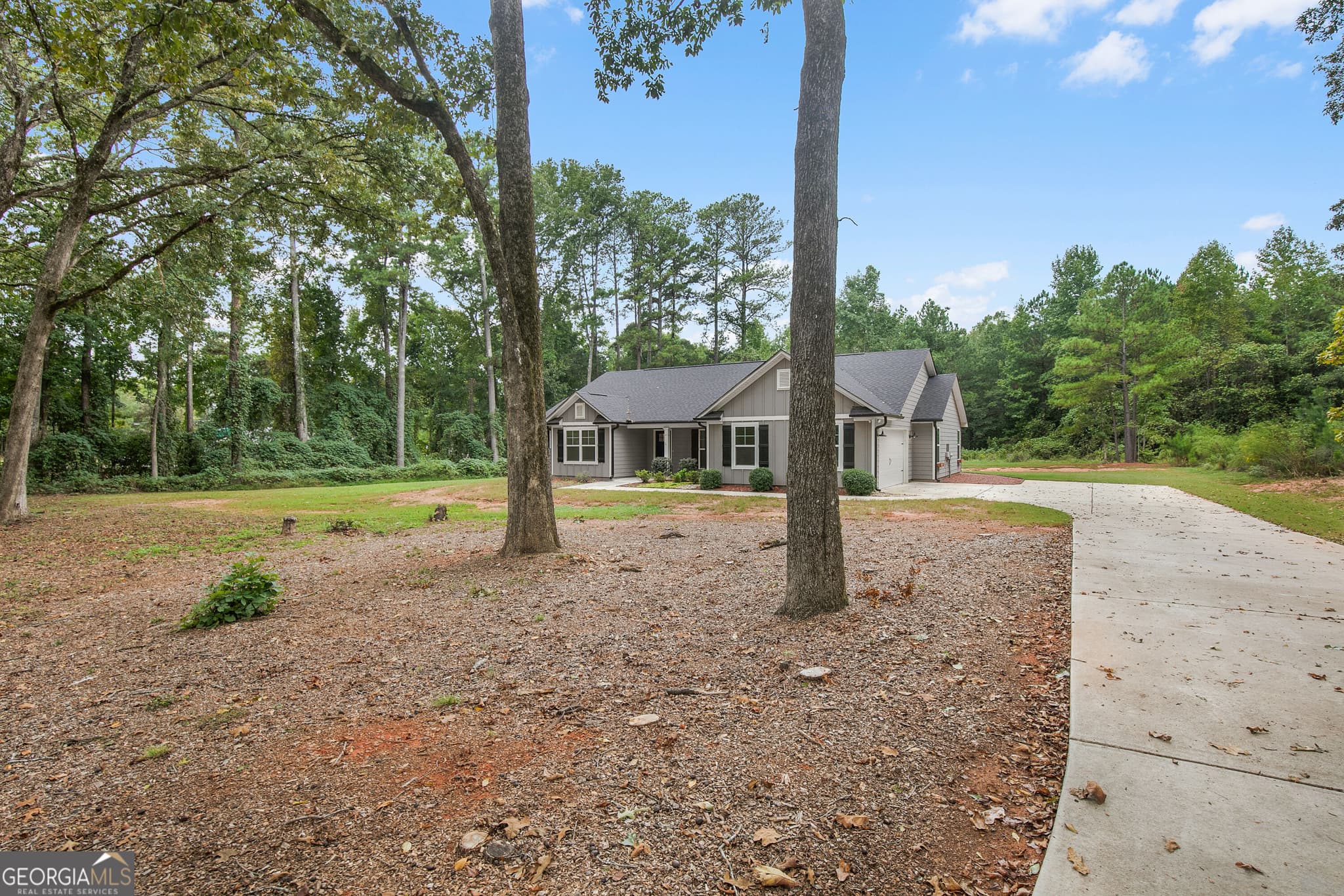 4 bedroom, 3 bathroom, 1,957 sq ft single family residence for sale at 1788 Standing Rock Road, Senoia, GA 30276 — photo 3