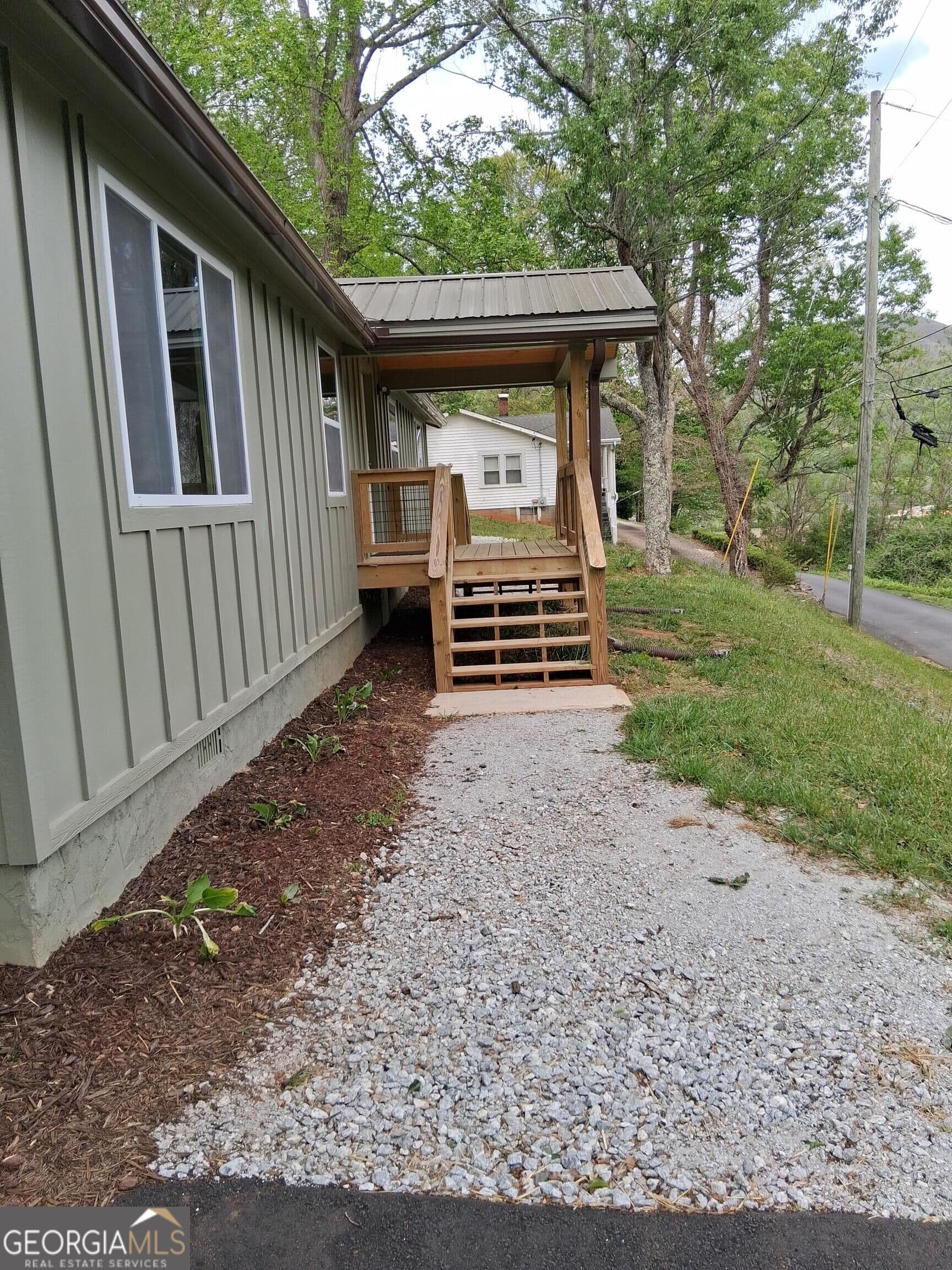 3 bedroom, 2 bathroom, 1,149 sq ft single family residence for sale at 143 Nelson Avenue, Clayton, GA 30525 — photo 2
