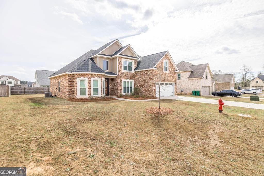 5 bedroom, 3 bathroom, 2,418 sq ft single family residence for sale at 613 Jeffery Thomas Drive, Bonaire, GA 31005 — photo 3