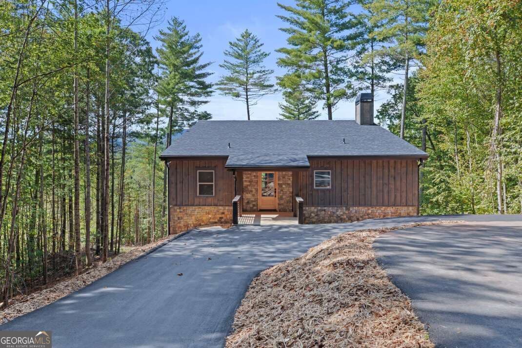 4 bedroom, 3 bathroom, 2,184 sq ft cabin,single family residence for sale at 135 Morgan Trail, Epworth, GA 30541 — photo 2
