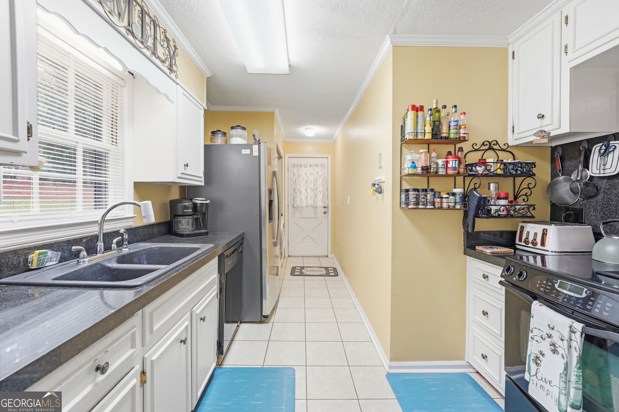 3 bedroom, 2 bathroom, 2,112 sq ft single family residence for sale at 142 Tanglewood Court, Eatonton, GA 31024 — photo 9