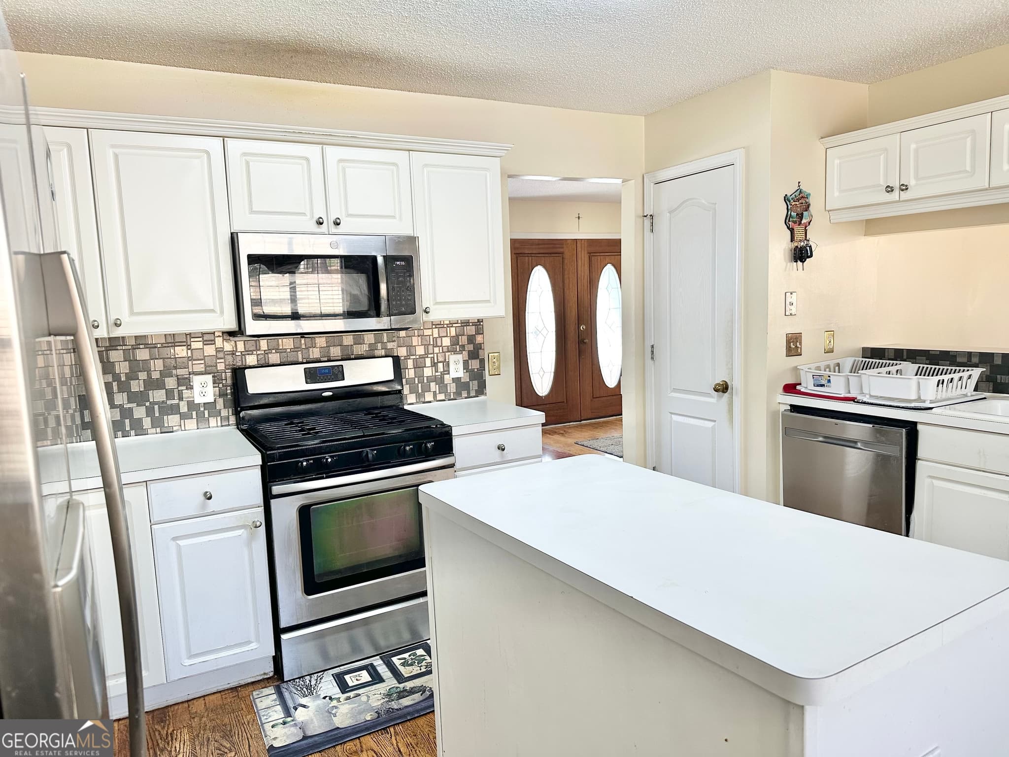 4 bedroom, 2.5 bathroom, 3,347 sq ft single family residence for sale at 12342 Lakeside Parkway, Fayetteville, GA 30215 — photo 4