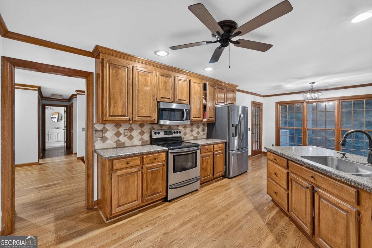 4 bedroom, 3 bathroom, 3,336 sq ft single family residence for sale at 1105 Secret Cove Drive, Sugar Hill, GA 30518 — photo 2