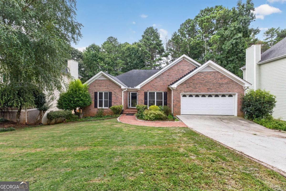 4 bedroom, 3 bathroom, 3,336 sq ft single family residence for sale at 1105 Secret Cove Drive, Sugar Hill, GA 30518 — photo 6