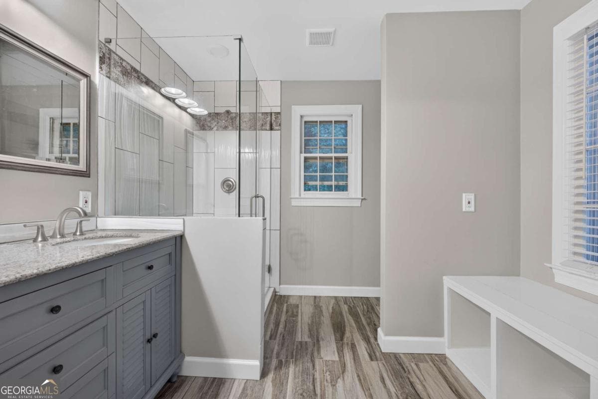 4 bedroom, 3 bathroom, 3,336 sq ft single family residence for sale at 1105 Secret Cove Drive, Sugar Hill, GA 30518 — photo 9