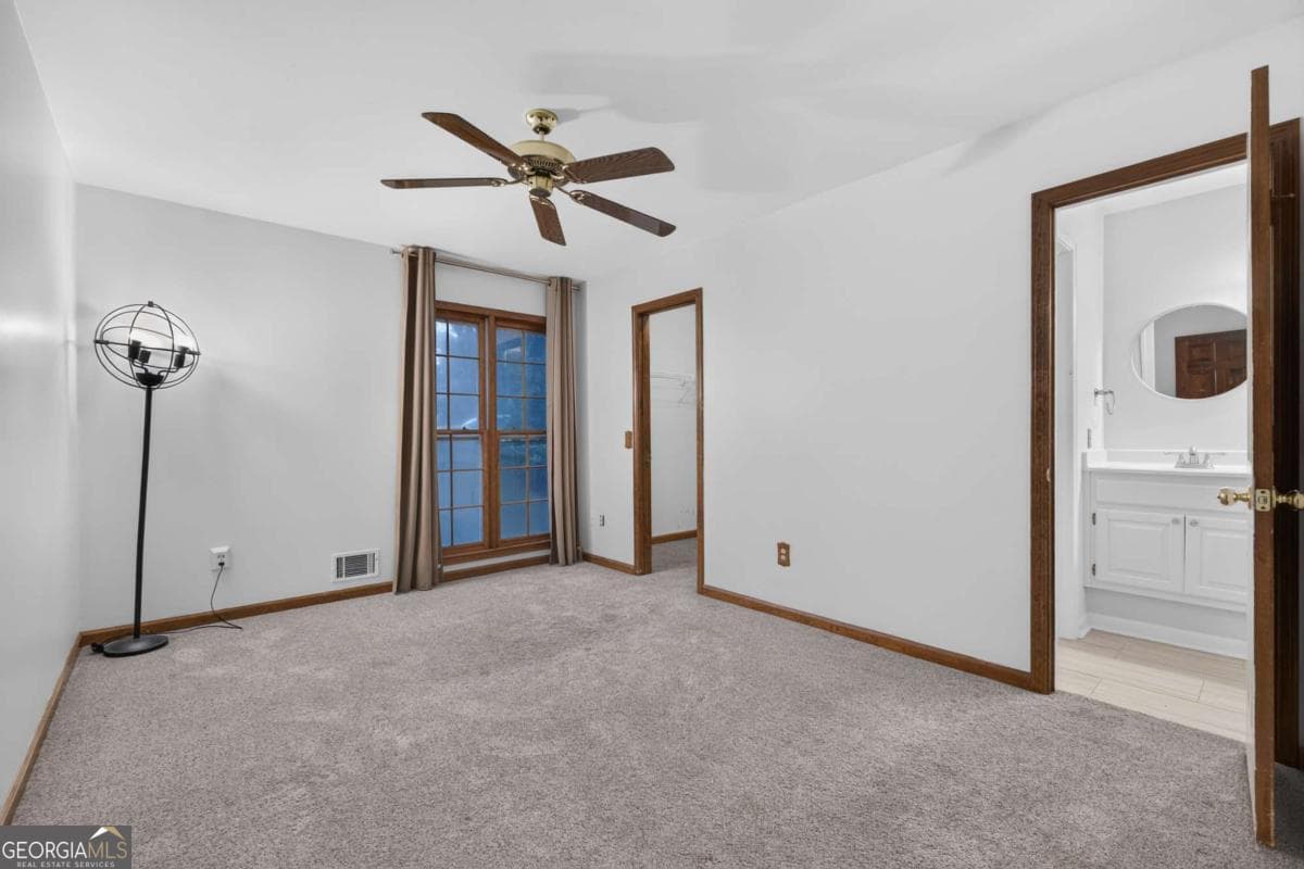 4 bedroom, 3 bathroom, 3,336 sq ft single family residence for sale at 1105 Secret Cove Drive, Sugar Hill, GA 30518 — photo 10