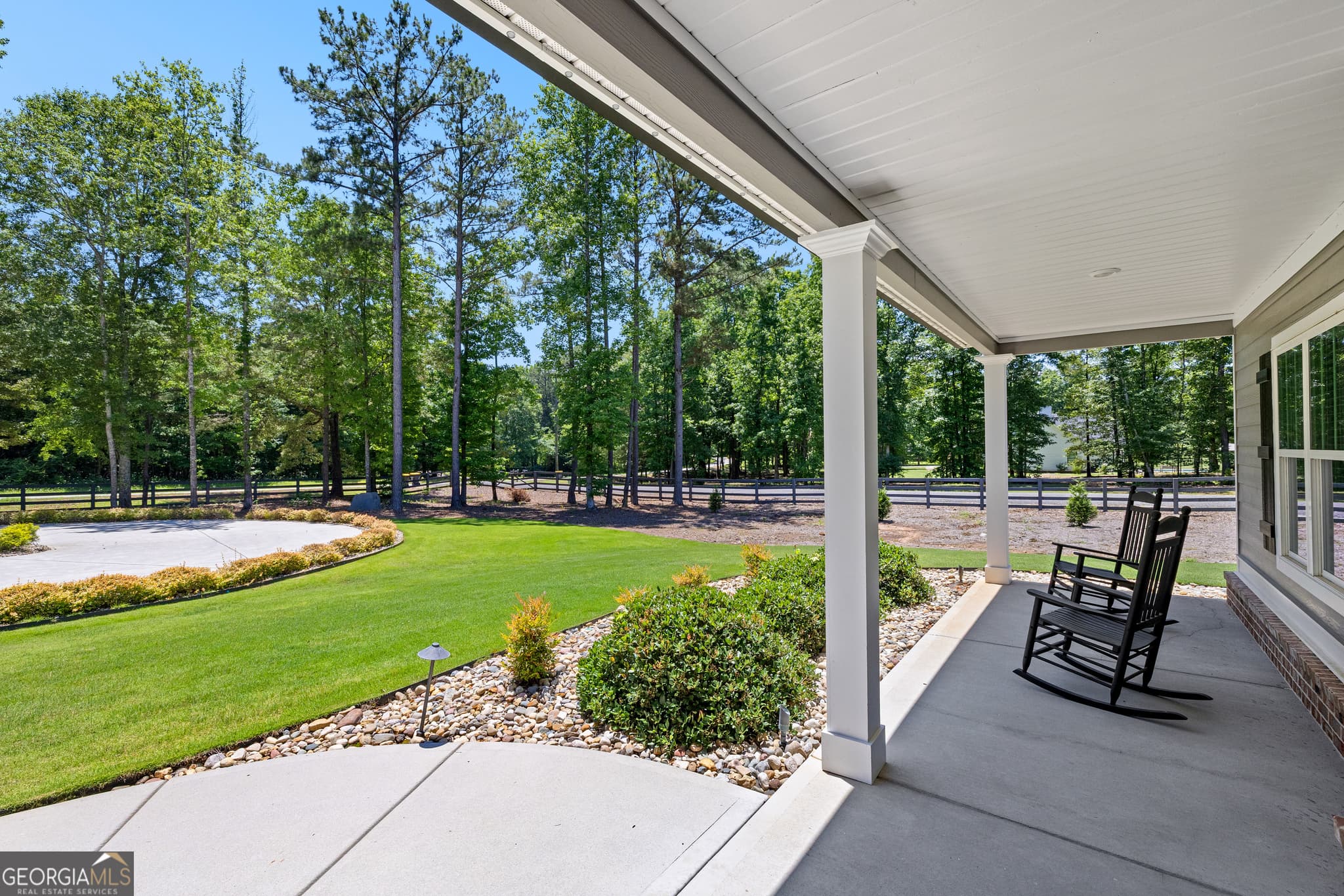 5 bedroom, 4 bathroom, 6,128 sq ft single family residence for sale at 878 McIntosh Trail, Sharpsburg, GA 30277 — photo 3